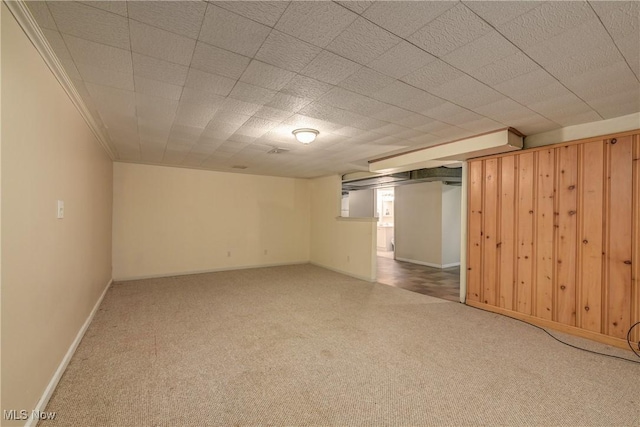 finished basement with carpet flooring and baseboards