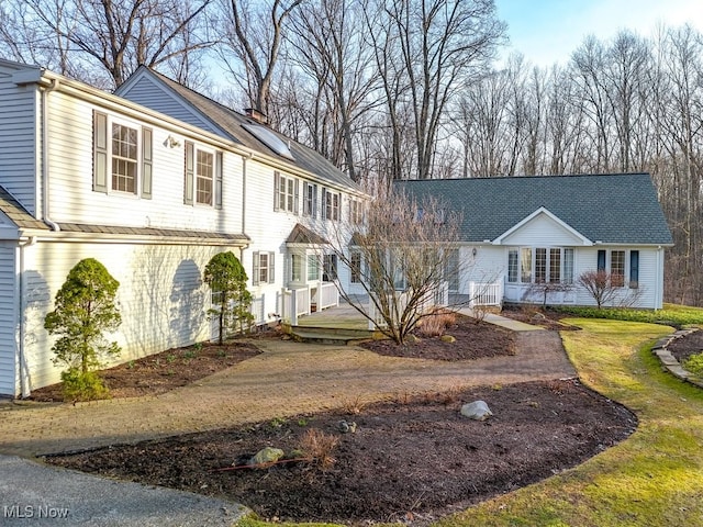 view of front of home with a chimney