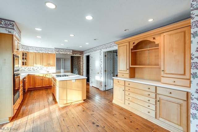 kitchen featuring open shelves, black appliances, and light brown cabinetry