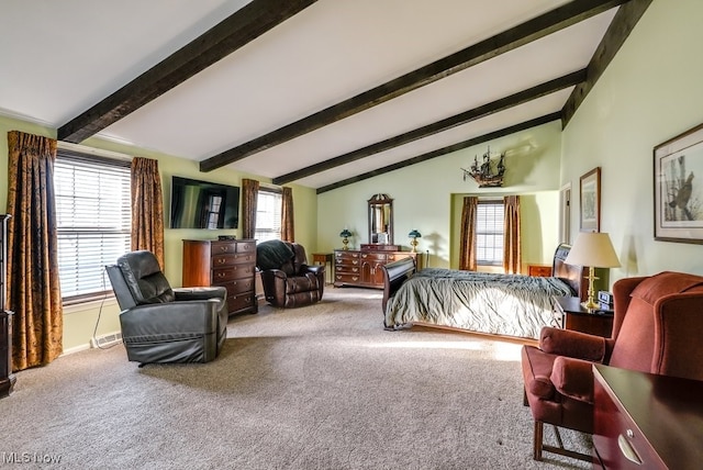 bedroom with multiple windows, vaulted ceiling with beams, and carpet floors