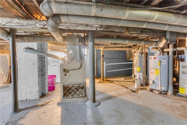 unfinished basement featuring gas water heater