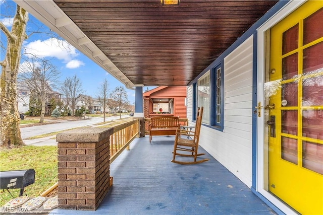 view of patio featuring a porch