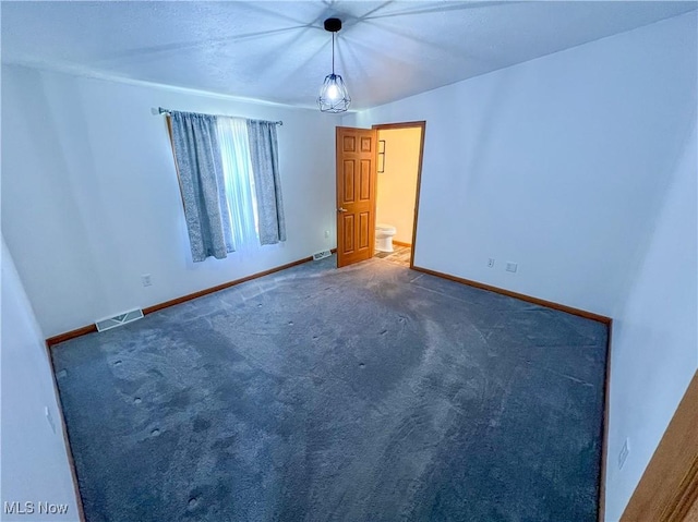 50055 Carroll Rd, East Liverpool, OH 43920 - unfurnished room with visible vents, carpet flooring, and baseboards