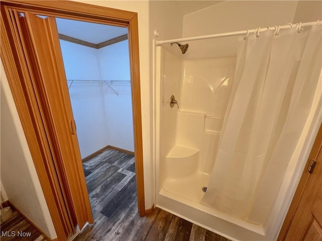 50055 Carroll Rd, East Liverpool, OH 43920 - bathroom featuring a shower stall, wood finished floors, and baseboards