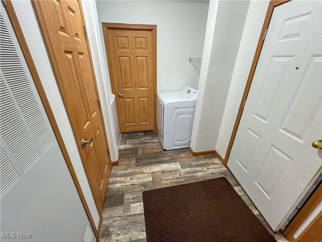 50055 Carroll Rd, East Liverpool, OH 43920 - washroom with a heating unit, baseboards, laundry area, washer / dryer, and wood finished floors