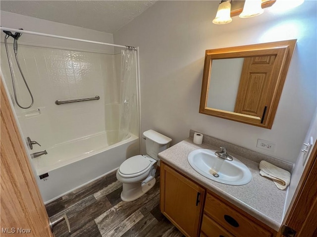 50055 Carroll Rd, East Liverpool, OH 43920 - full bathroom with shower / bathtub combination with curtain, toilet, a textured ceiling, wood finished floors, and vanity