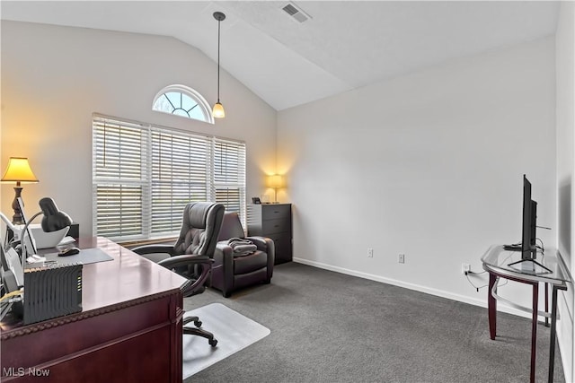 office space featuring visible vents, baseboards, lofted ceiling, and dark colored carpet