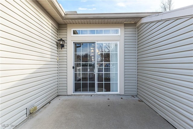 doorway to property featuring a patio area