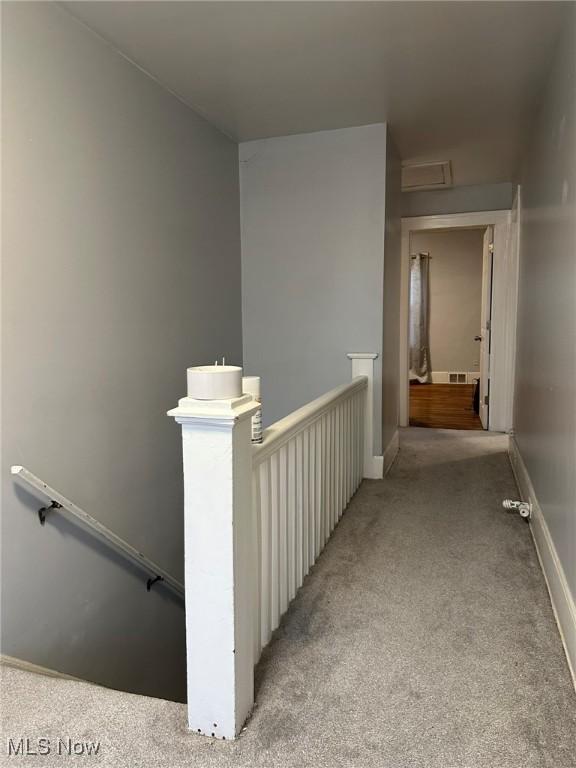 174 Colony Cres, Akron, OH 44305 - corridor with an upstairs landing, carpet floors, and baseboards