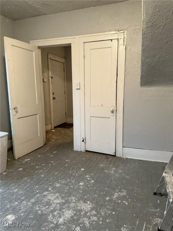 174 Colony Cres, Akron, OH 44305 - unfurnished room with a textured wall