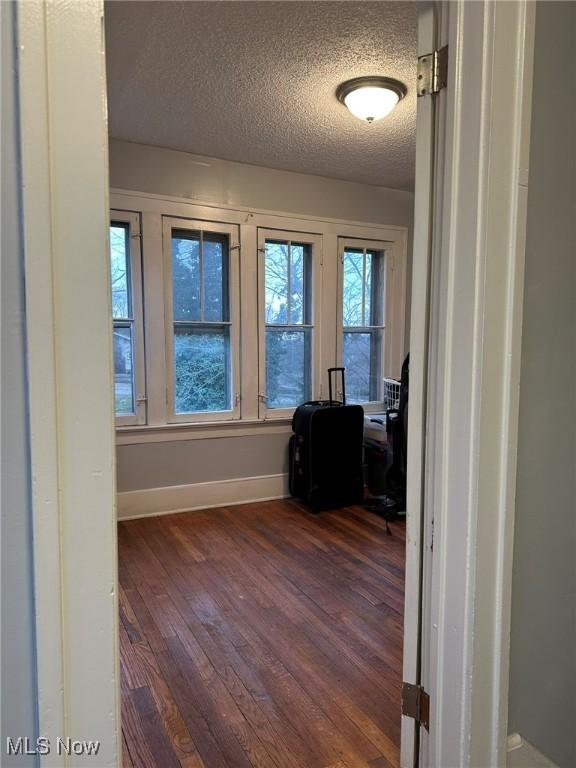 174 Colony Cres, Akron, OH 44305 - office area with baseboards, dark wood-style floors, and a textured ceiling