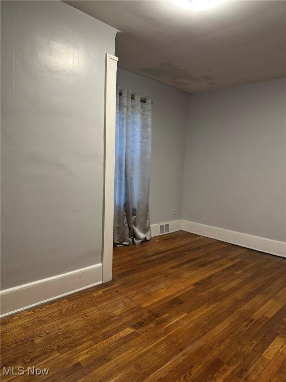 174 Colony Cres, Akron, OH 44305 - empty room with hardwood / wood-style floors and baseboards