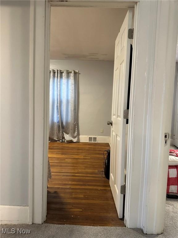 174 Colony Cres, Akron, OH 44305 - corridor with wood finished floors and baseboards