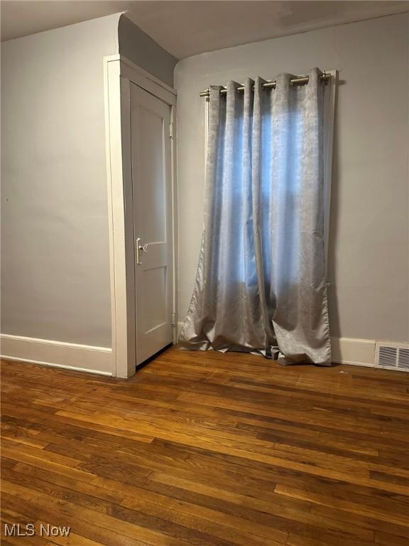 174 Colony Cres, Akron, OH 44305 - unfurnished room featuring hardwood / wood-style floors and baseboards