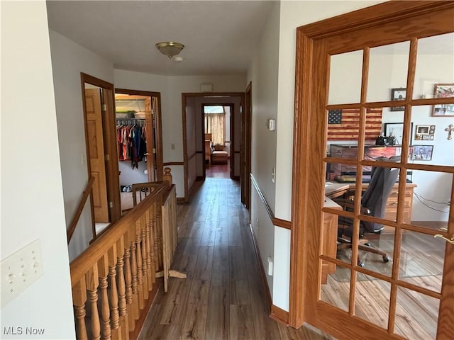 31 Briar Ln, Millersburg, OH 44654 - hallway featuring baseboards and dark wood-type flooring