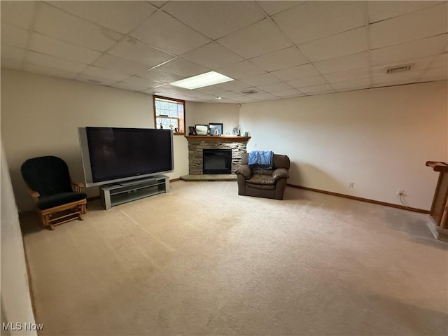 31 Briar Ln, Millersburg, OH 44654 - sitting room with a stone fireplace, carpet flooring, and a paneled ceiling