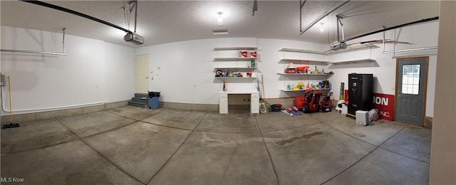 31 Briar Ln, Millersburg, OH 44654 - garage featuring baseboards and a garage door opener