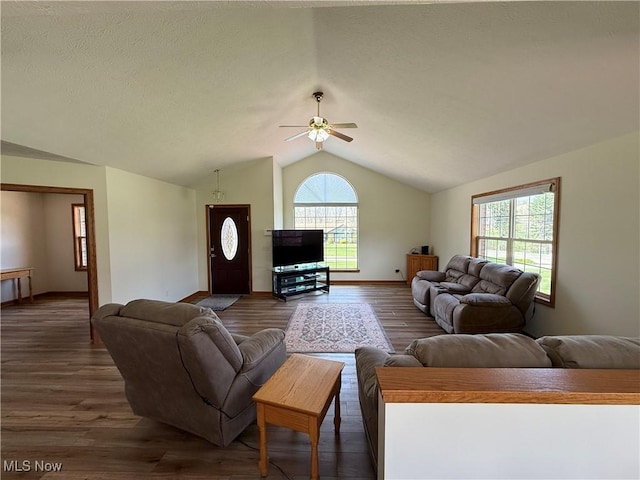 31 Briar Ln, Millersburg, OH 44654 - living area with vaulted ceiling, a ceiling fan, baseboards, and wood finished floors