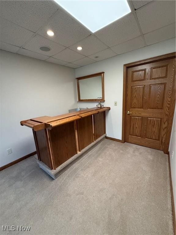 31 Briar Ln, Millersburg, OH 44654 - bar featuring light colored carpet, baseboards, a drop ceiling, and recessed lighting