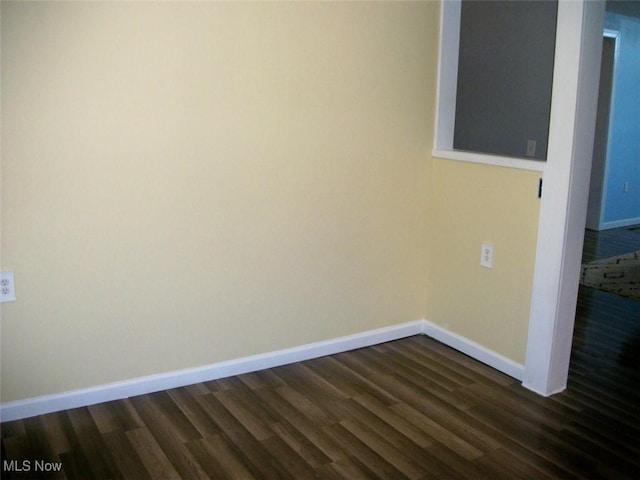 8045 State Route 555, Cutler, OH 45724 - empty room with dark wood-type flooring and baseboards