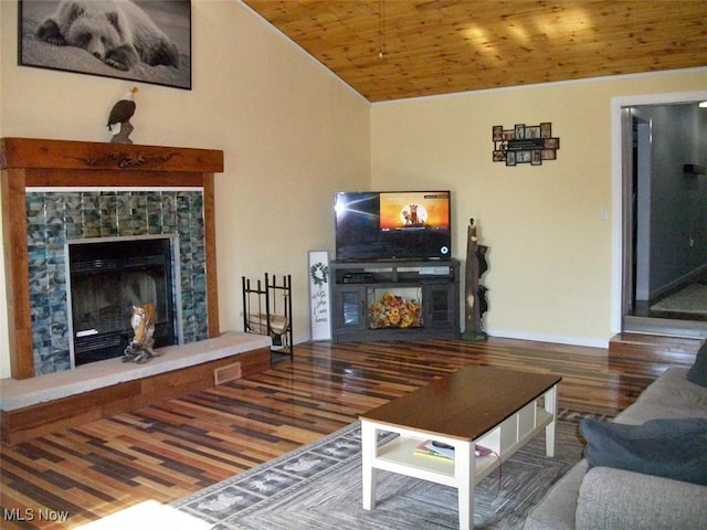 8045 State Route 555, Cutler, OH 45724 - living room featuring lofted ceiling, wood ceiling, wood finished floors, and a fireplace