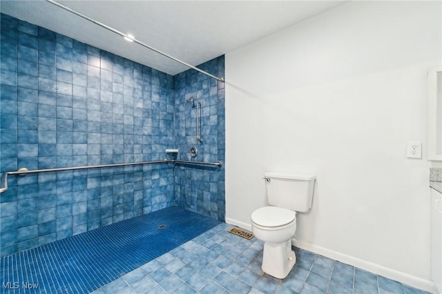 bathroom with tile patterned flooring, visible vents, baseboards, toilet, and tiled shower