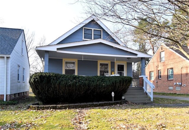 bungalow-style home with a porch