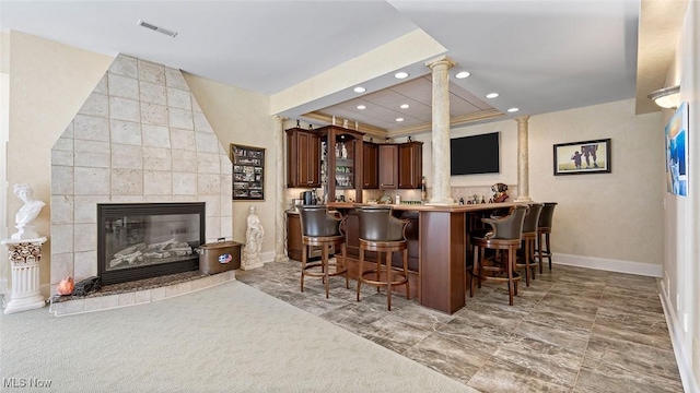 1524 Eagle Watch St NE, Canton, OH 44721 - bar with baseboards, visible vents, recessed lighting, a tile fireplace, and bar area