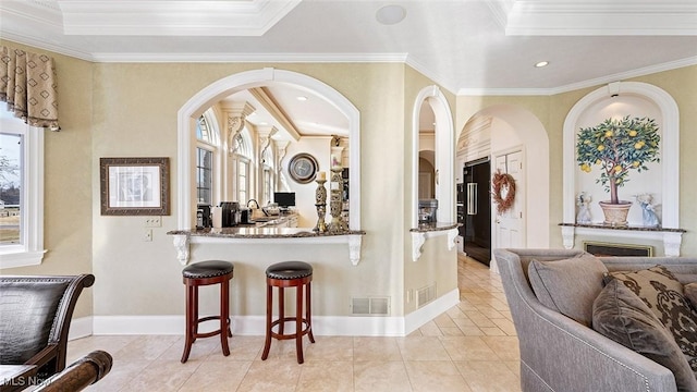 1524 Eagle Watch St NE, Canton, OH 44721 - bar featuring light tile patterned floors, baseboards, visible vents, recessed lighting, and crown molding