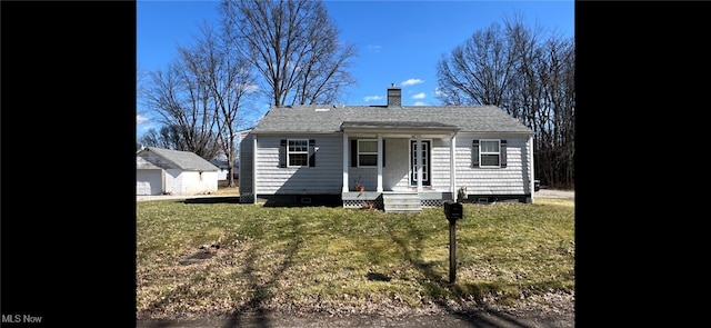 1865 Triumph Ave, Lake Milton, OH 44429 - view of front of house featuring a front lawn, crawl space, an outdoor structure, and a chimney