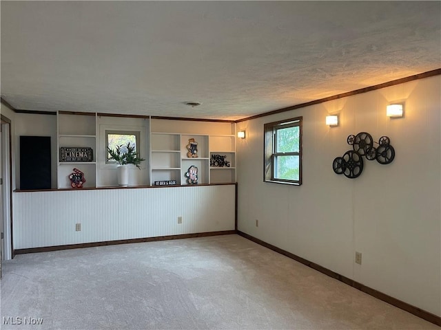 1984 Hebron Rd, Saint Marys, WV 26170 - carpeted spare room with ornamental molding, baseboards, and a textured ceiling