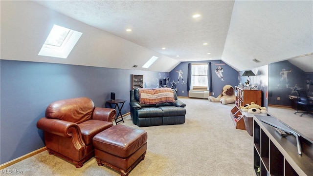 carpeted bedroom featuring recessed lighting, vaulted ceiling with skylight, a textured ceiling, and baseboards