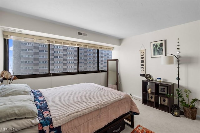 12550 Lake Ave Unit 607, Lakewood, OH 44107 - bedroom with visible vents and carpet flooring