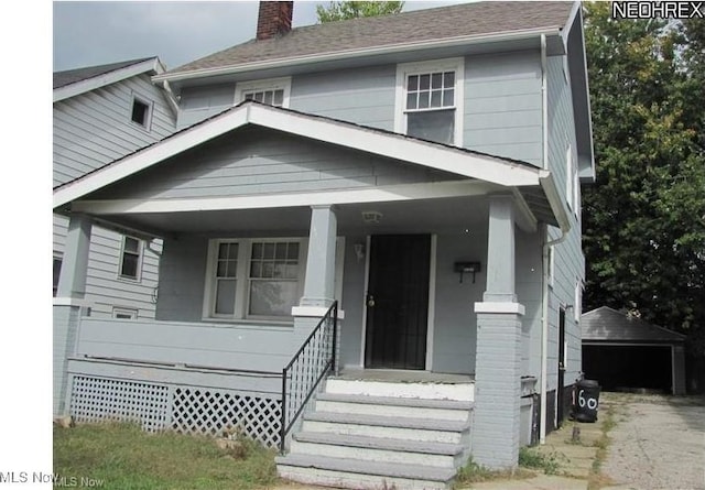 13605 Kelso Ave, Cleveland, OH 44110 - view of front of property featuring covered porch and a chimney