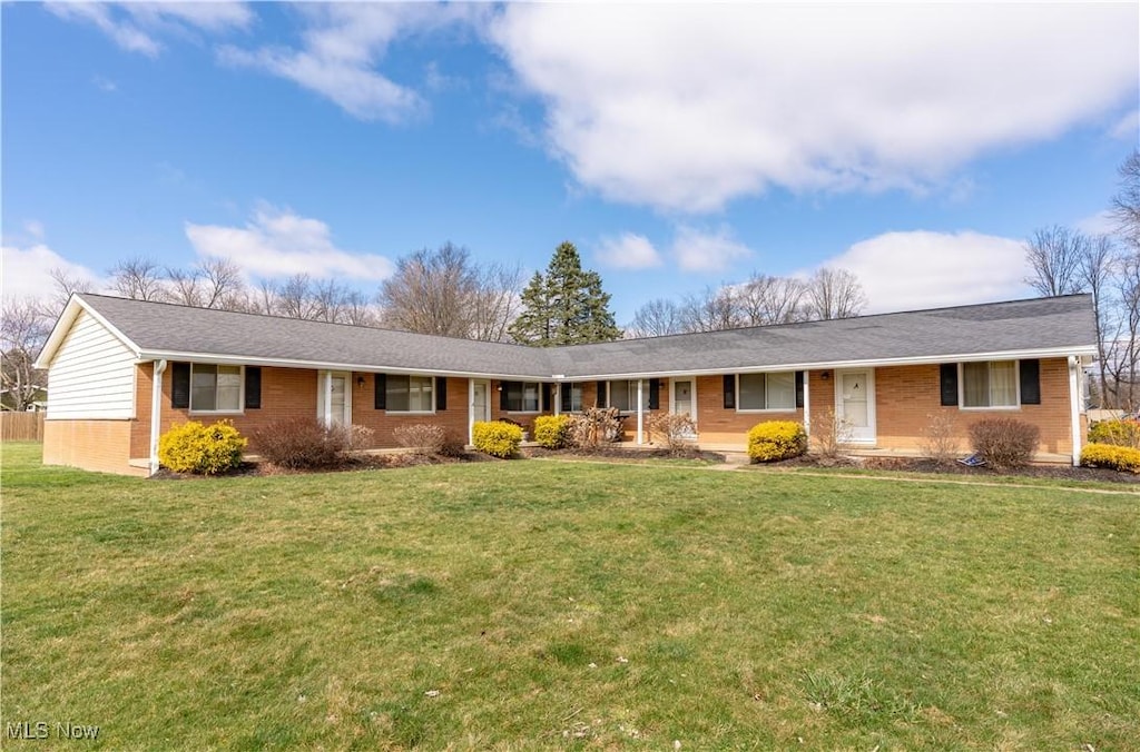 5064 S Main St, New Franklin, OH 44319 - single story home featuring brick siding and a front yard