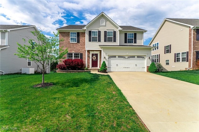 784 Hilliary Ln, Aurora, OH 44202 - traditional home with an attached garage, brick siding, driveway, and a front lawn