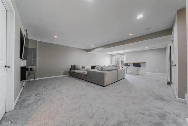 784 Hilliary Ln, Aurora, OH 44202 - carpeted living room featuring baseboards and recessed lighting