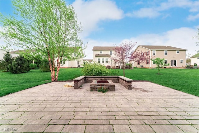 784 Hilliary Ln, Aurora, OH 44202 - view of home's community featuring a patio, a lawn, a fire pit, and a residential view