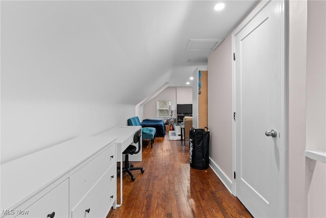 office space featuring dark wood-style flooring, vaulted ceiling, recessed lighting, and attic access