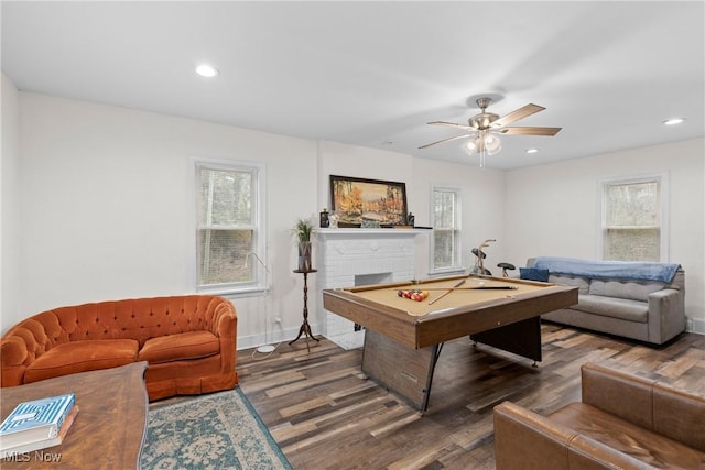 game room featuring a fireplace, wood finished floors, recessed lighting, a ceiling fan, and pool table