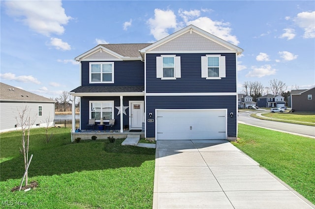 view of front of house with an attached garage, a porch, a front yard, and driveway