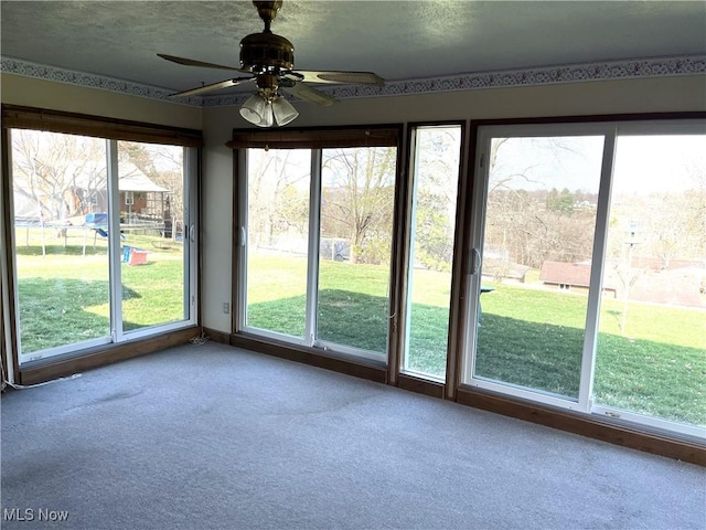unfurnished sunroom with a healthy amount of sunlight