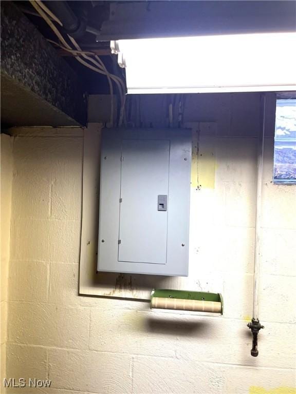 utility room featuring electric panel
