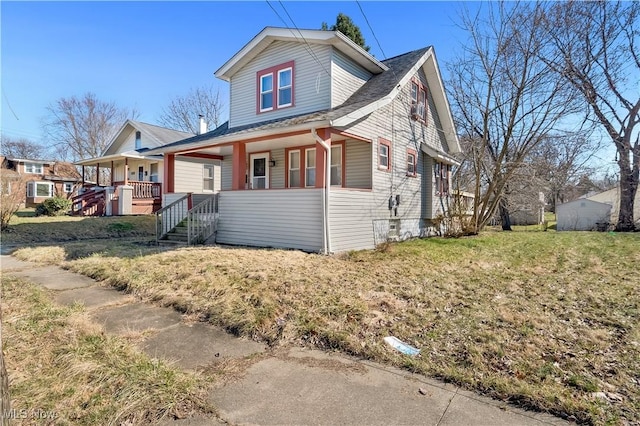 1292 Tampa Ave, Akron, OH 44314 - bungalow-style house with covered porch and a front yard