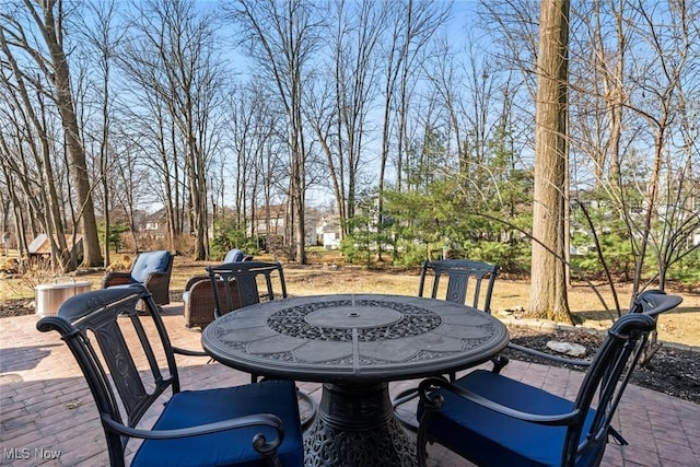 view of patio featuring outdoor dining area
