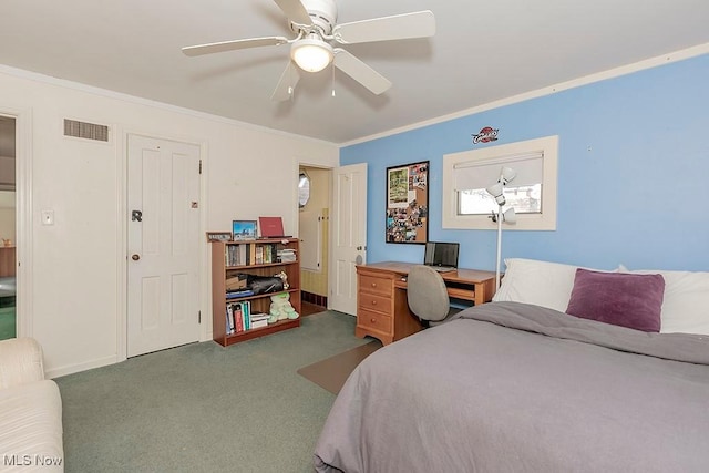 bedroom featuring visible vents, ornamental molding, a ceiling fan, carpet flooring, and baseboards
