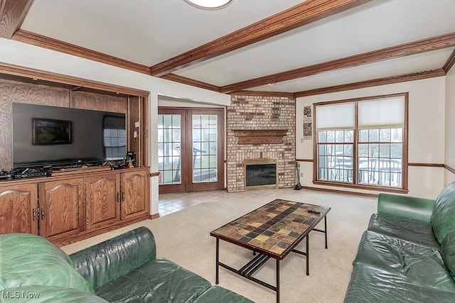 living area with a wealth of natural light, beam ceiling, light colored carpet, and crown molding