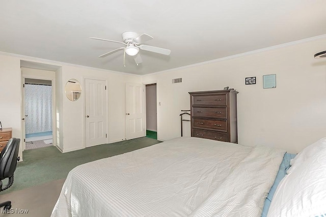 carpeted bedroom with ceiling fan, ensuite bath, visible vents, and ornamental molding