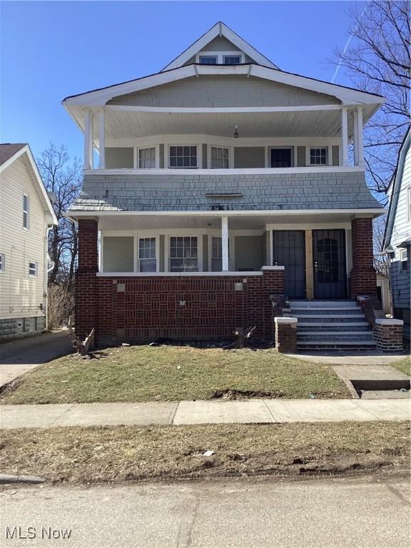 3370 E 145th St, Cleveland, OH 44120 - view of front of house featuring brick siding and covered porch