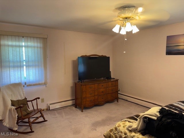 1317 Hartzell, Niles, OH 44446 - bedroom with light colored carpet, a ceiling fan, and a baseboard radiator